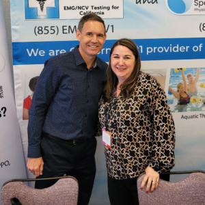 Ron Lerch, one of the founders of Precision Occupational Medical Group, stopping by to  check in at our booth with Case Facilitator Melanie Greene.